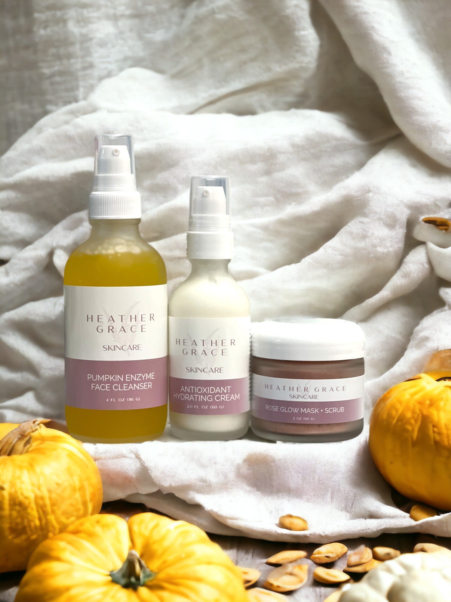 Pumpkin Enzyme Face Cleanser in a vibrant seasonal setting.
Antioxidant Hydrating Cream alongside fall decor.
Rose Glow Mask + Scrub ready for application.