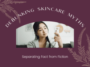 A woman examining her face in a hand mirror, with a thoughtful expression, set against a home interior background. The image is overlaid with the text 'DEBUNKING SKINCARE MYTHS' in bold, white font on a dark purple banner. Beneath the main title, the phrase 'Separating Fact from Fiction' is written in a lighter font, adding context to the image, which is designed to represent the introspective process of learning true skincare practices.